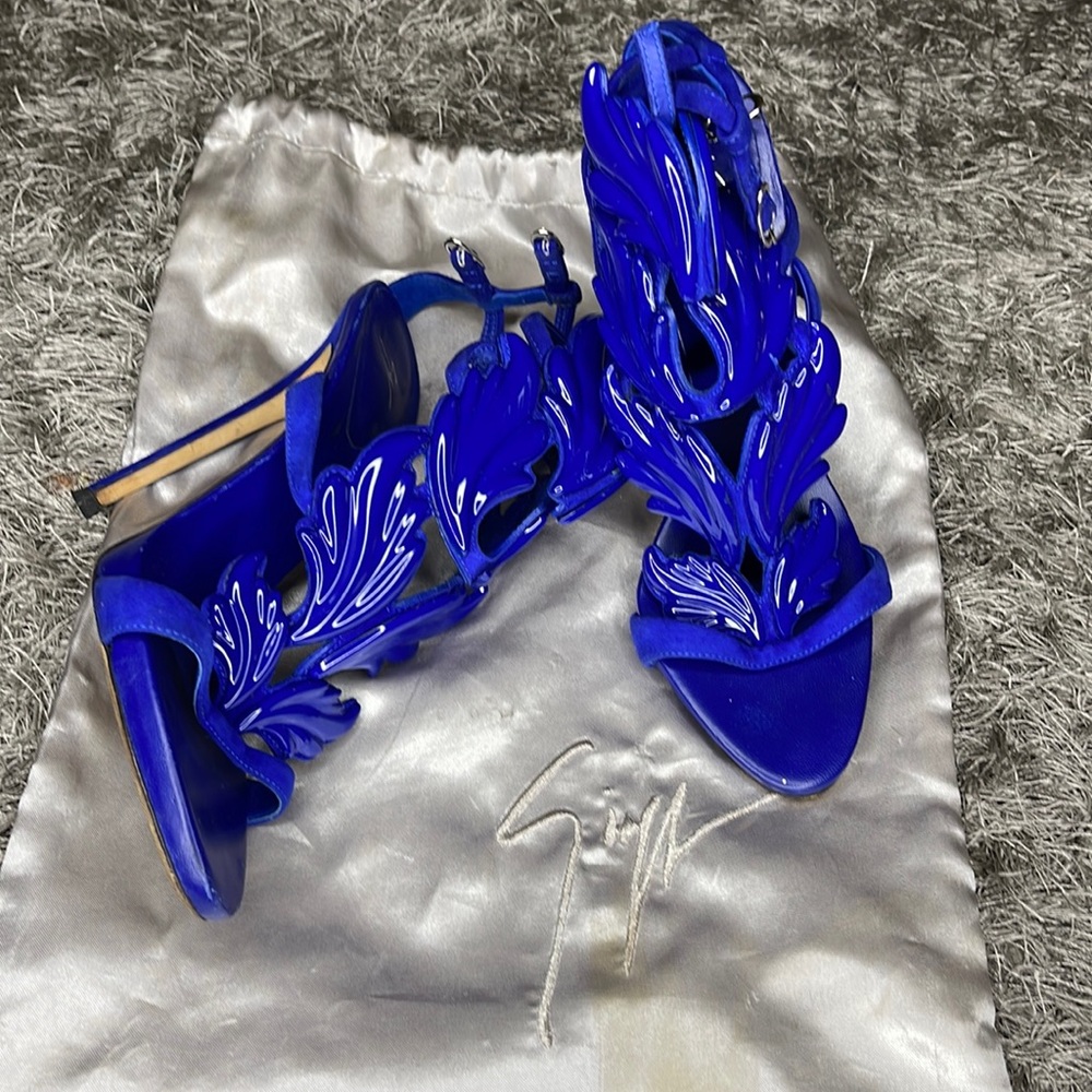 Leather and suede Royal Blue side buckle fastenings and high stilletto heel.